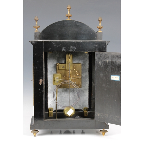 252 - A late 19th century Boulle work mantel clockRoman numerals to face, three flaming torch brass finial... 