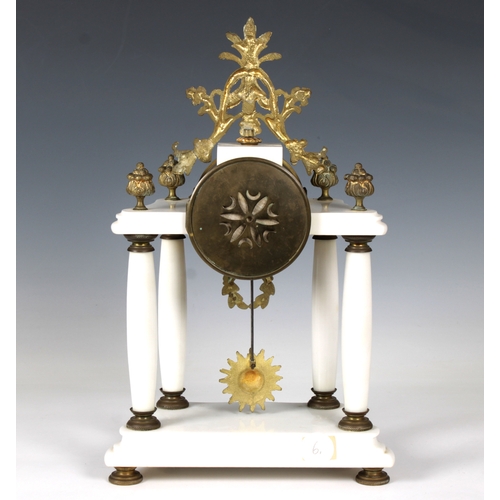 259 - An early 20th century marble and brass French portico clockwith brass crest and finials, the enamell... 