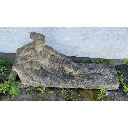 270 - Garden statuary - A reconstituted stone figure of a recumbent female on a chaise longue / day bed91c... 