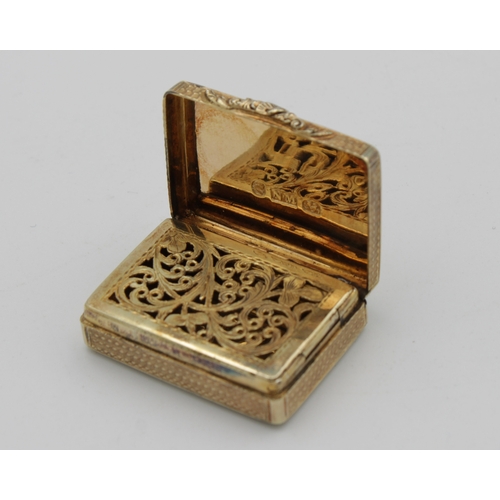 283 - A William IV silver-gilt rounded rectangular vinaigretteNathaniel Mills, Birmingham, 1830, engine-tu... 