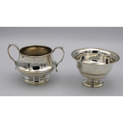 312 - A silver twin handle sugar basinA L Davenport Ltd, of pedestal form, reeded rim, 13.4cm. handle to h... 