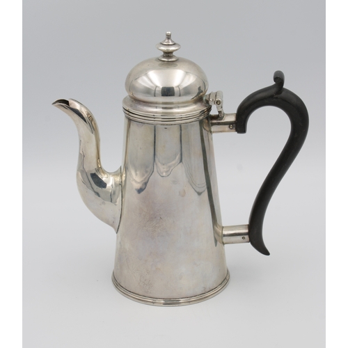 321 - An Edwardian silver coffee potGeorge Nathan & Ridley Hayes, Chester, 1906, conical form with with eb... 