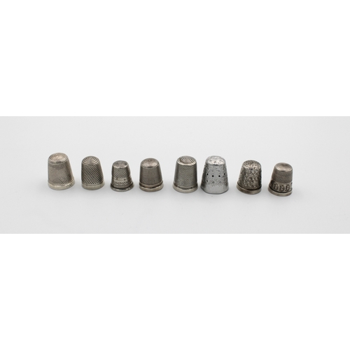 348 - Eight sterling silver and white metal thimbles of varying types. (8)