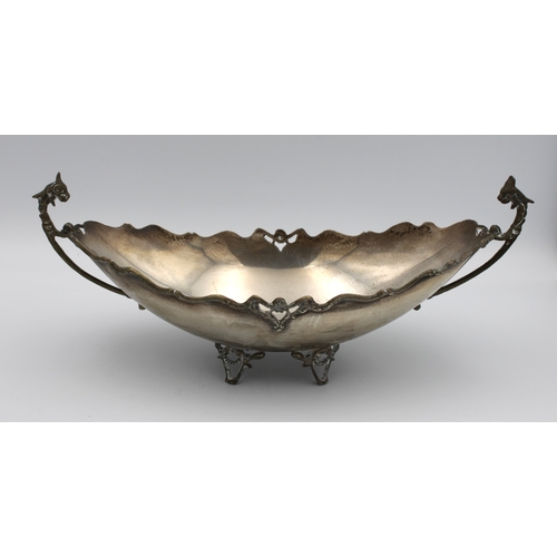 360 - A Greek 925 silver boat shaped dishwith mythical beast twin handles, wavy edge, raised on four pierc... 