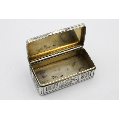 376 - A Russian silver rectangular snuff boxMoscow 84 Zolotnik mark and others, of rectangular form with r... 