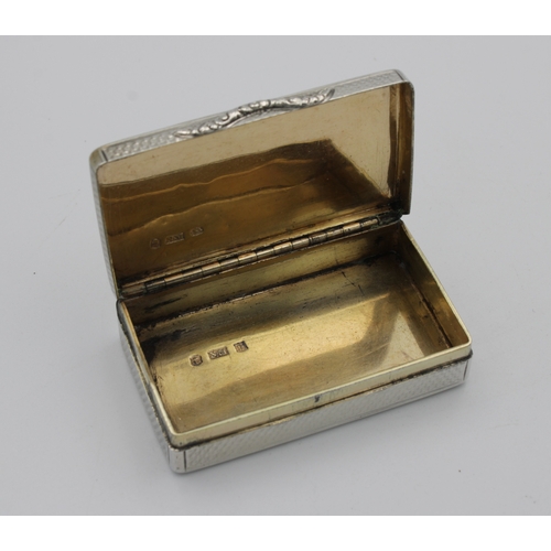 381 - A William IV silver snuff boxNathaniel Mills, Birmingham, 1833, of rectangular engine turned design,... 