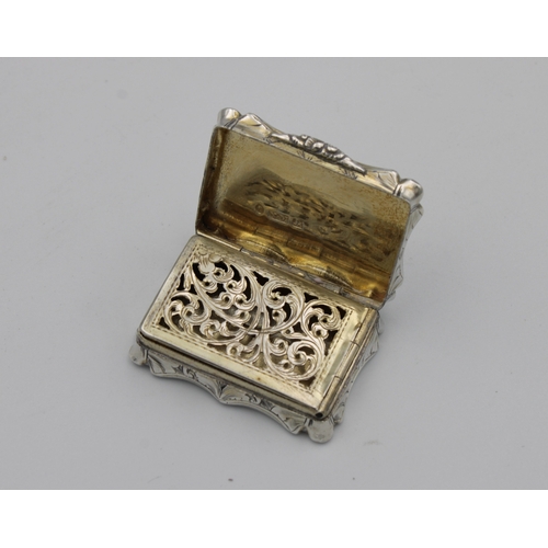 387 - A Victorian silver shaped rectangular vinaigretteNathaniel Mills, Birmingham, 1851, all over foliate... 