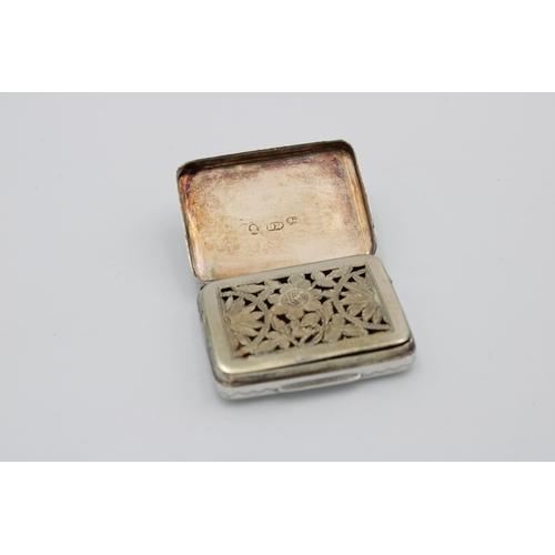 388 - A George III silver vinaigretteSamuel Pemberton, Birmingham, 1810, of rounded rectangular form, the ... 