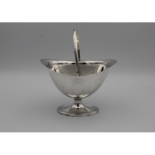 390 - A George III silver swing handled sugar basket or sucrierindistinct maker's mark, London, 1785, nave... 