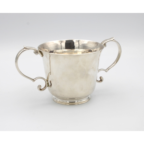 396 - A Queen Elizabeth II Britannia standard silver twin handled porringerplain polished everted form, tw... 