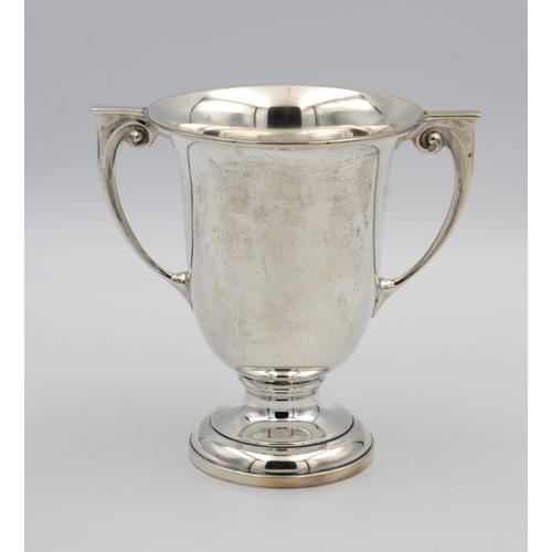 414 - A silver twin handle trophy cupWilliam Neale & Son Ltd, Birmingham, 1930, having wide rim, flat top ... 