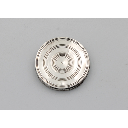 424 - A Continental silver (white metal) circular Butt markerthe rotating top with raised decoration and t... 