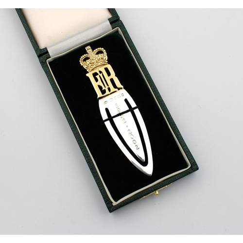 428 - A boxed silver and silver-gilt Commemorative bookmark engraved 1952-2002the gilded crown and EIIR ov... 