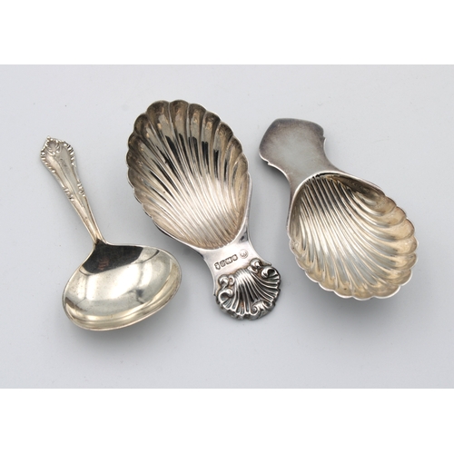 446 - Two silver caddy spoonsby Francis Howard Ltd, two of scallop shell form, together with another, 1.95... 