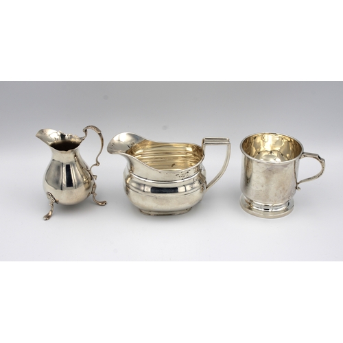 453 - A Georgian style silver milk jugWilliam Hutton & Sons Ltd, Sheffield, 1951, 13cm. long, together wit... 