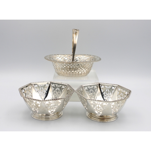 462 - A pair of silver octagonal pierced bon bon dishesMappin & Webb, Sheffield,1934, the shaped dishes wi... 