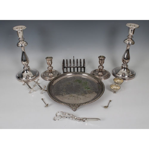 465 - A collection of various silver plateto include a pair of candlesticks with silver sleeves to sconces... 