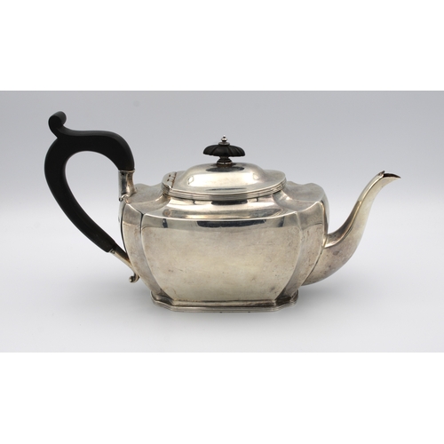 466 - A silver teapotHarrison Brothers & Howson, Sheffield, 1918, of shaped and bellied oval form with ebo... 