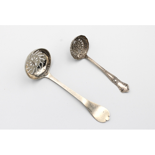 485 - Two silver sifter spoons, to include a Victorian fancy silver sifter spoonCornelius Desormeaux Saund... 