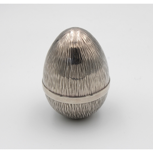 493 - A Channel Islands silver Surprise Egg by Bruce Russellimited edition number and date letter rubbed, ... 