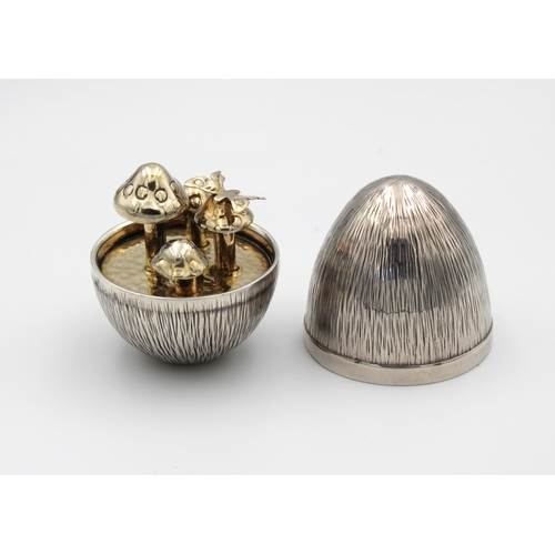 493 - A Channel Islands silver Surprise Egg by Bruce Russellimited edition number and date letter rubbed, ... 