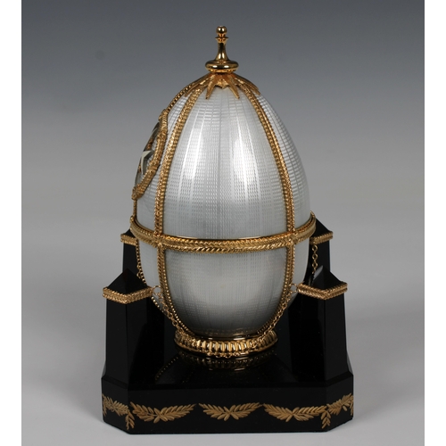 514 - A Sarah Faberge "The Order of St John" silver gilt and guilloche enamel eggthe silver-gilt... 