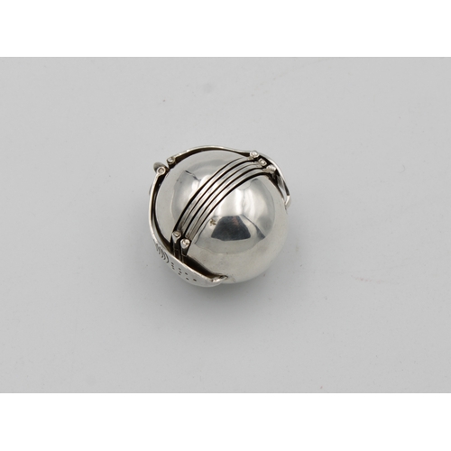 542 - A ball-shaped, six section, Continental silver (white metal) photograph frame/pendant.