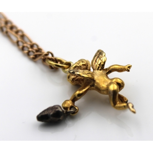 585 - An 18ct yellow gold cherub charm on 15ct gold chain38cm. long.