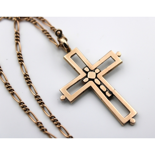 586 - A fancy garnet & seed pearl cross on 15ct gold chain45cm. long.