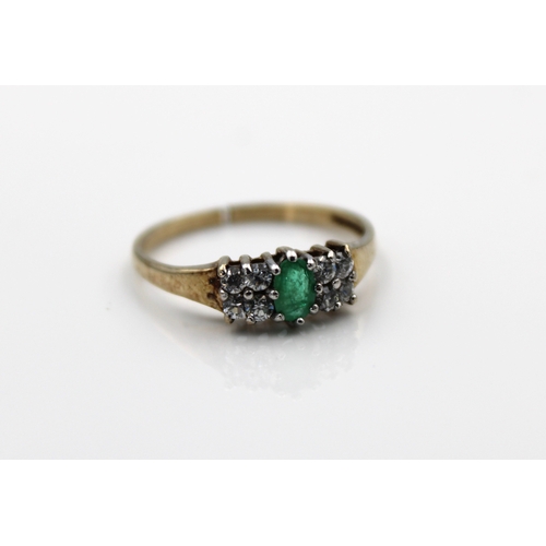 614 - A 9ct gold emerald and white stone ringsize O.