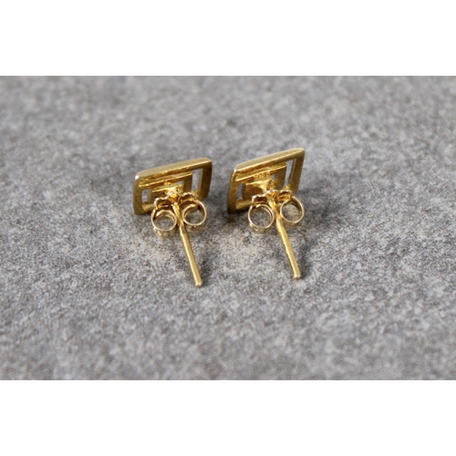 663 - A pair of 14k yellow gold Greek key earrings