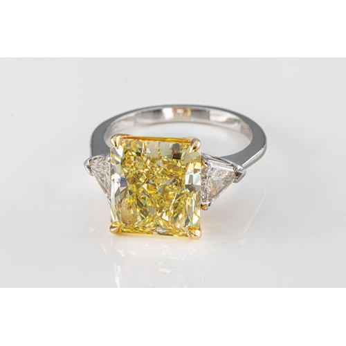 666 - A stunning natural yellow solitaire diamond ringthe cut cornered rectangular modified brilliant-cut ... 