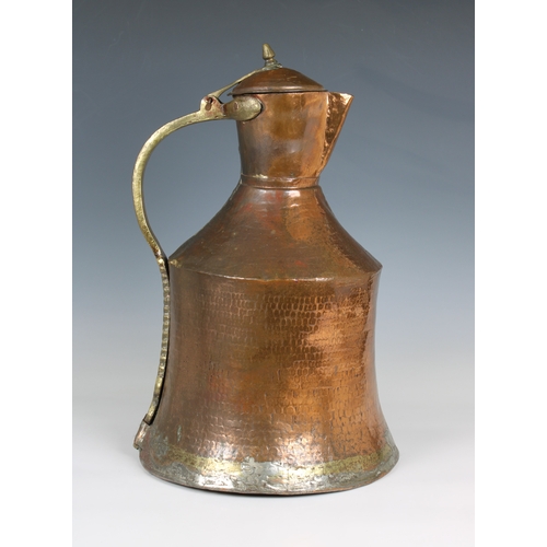 775 - A large Islamic / Persian copper and brass water jugprobably 19th century, of waisted cylindrical fo... 