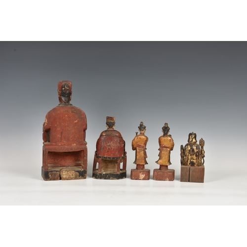 786 - Five Chinese lacquered and parcel gilt carved wooden figuresprobably 19th century, comprising two fi... 