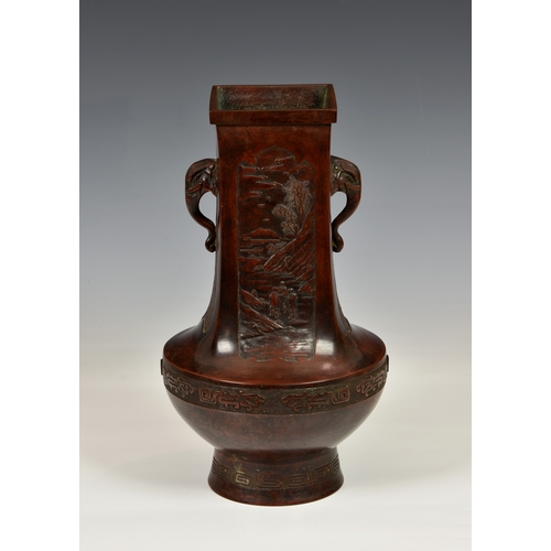 787 - A Chinese patinated bronze two handled hu vaseprobably 18th/19th century, with apocryphal Xuande six... 