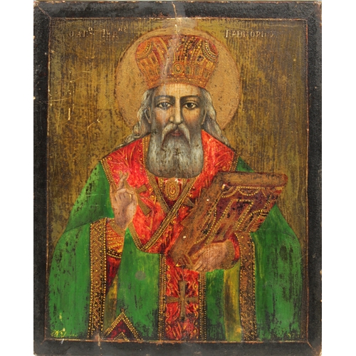 1027 - An icon of St. Nicholasor another Saint, holding in his left hand a closed book and his right hand m... 