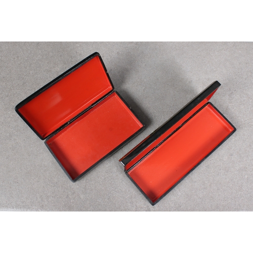 1035 - Two 20th century Russian lacquered boxesof rectangular form, the hinged covers decorated with strawb... 