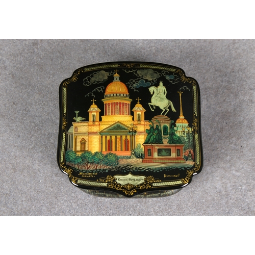 1051 - A 20th century Russian Lacquered boxof shaped square cushion form, the pull-off cover depicting CAHK... 