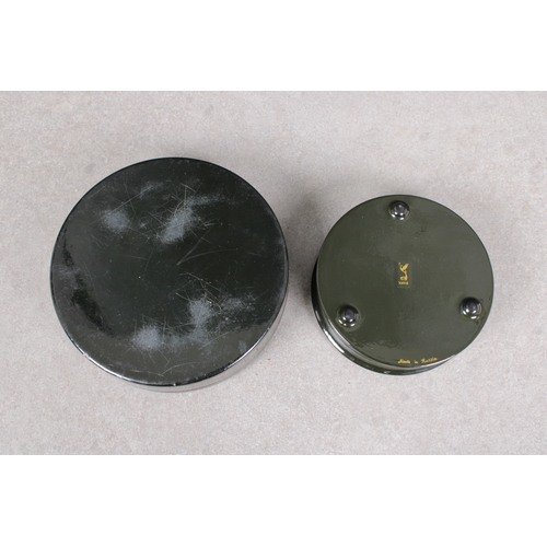 1053 - Two mid to late 20th century Russian Lacquered boxesof circular form with pull-off covers, depicting... 