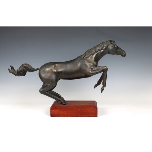 1094 - Somchai Hattakitkosol (Thai, 1934-2000)Galloping Horse, bronze, on a wooden base, impressed on leg '... 