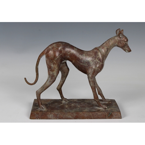 1106 - A 20th Century bronze statuette of a sight houndOn an integral plinth, 18.5cm high