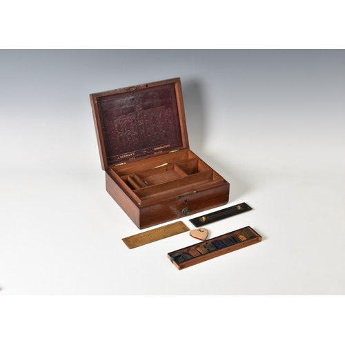 1115 - A Victorian artist's paint boxmahogany box with a single drawer, with a tolled leather insert to lid... 