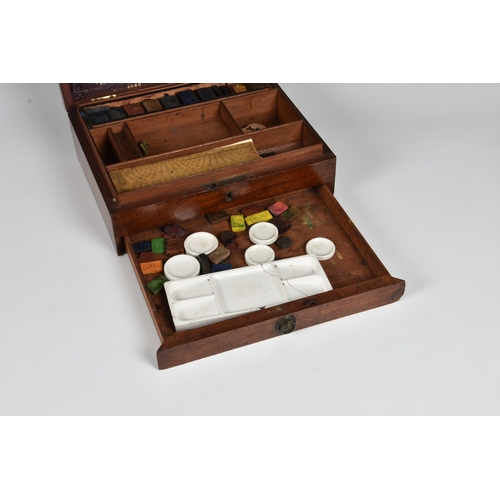 1115 - A Victorian artist's paint boxmahogany box with a single drawer, with a tolled leather insert to lid... 