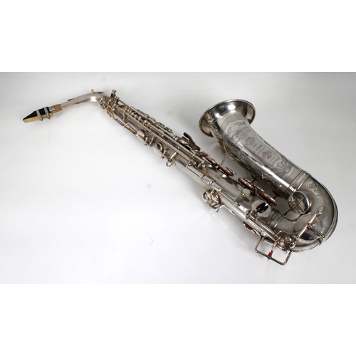 1164 - A Selmer silver plate alto saxophone - the engraved bell with serial number 14259, in fitted case.