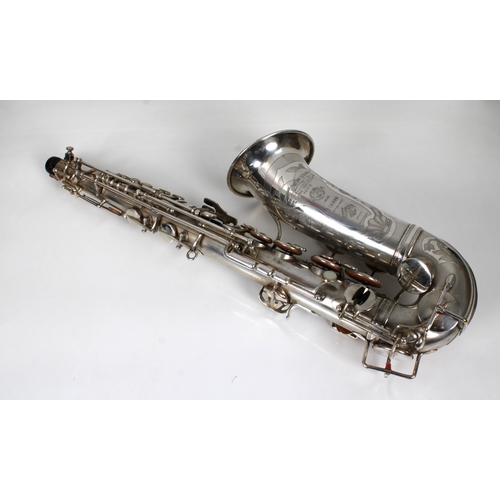 1164 - A Selmer silver plate alto saxophone - the engraved bell with serial number 14259, in fitted case.