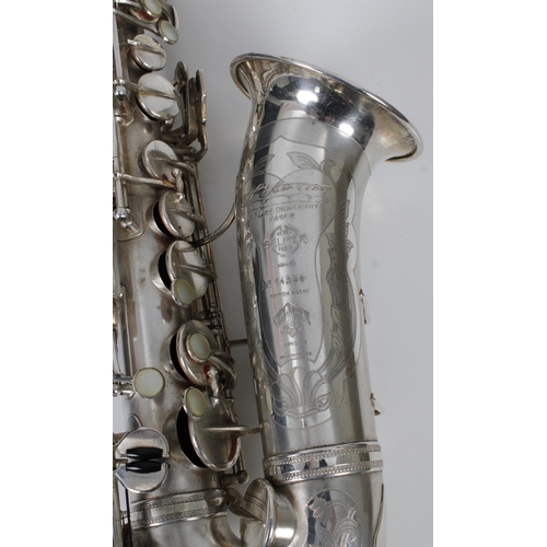 1164 - A Selmer silver plate alto saxophone - the engraved bell with serial number 14259, in fitted case.