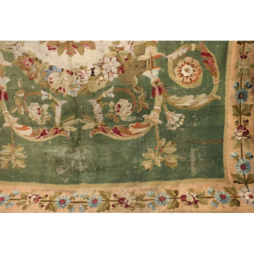 1170 - A Louis XVI Beauvais needlepoint tapestry hangingFrench, circa 1780, of a symmetrical classical scro... 