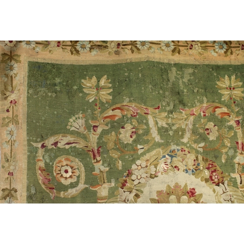 1170 - A Louis XVI Beauvais needlepoint tapestry hangingFrench, circa 1780, of a symmetrical classical scro... 