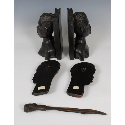 1171 - A small group of Ghanaian wooden carvingsto include a pair of bookends, a letter opener and a pair o... 