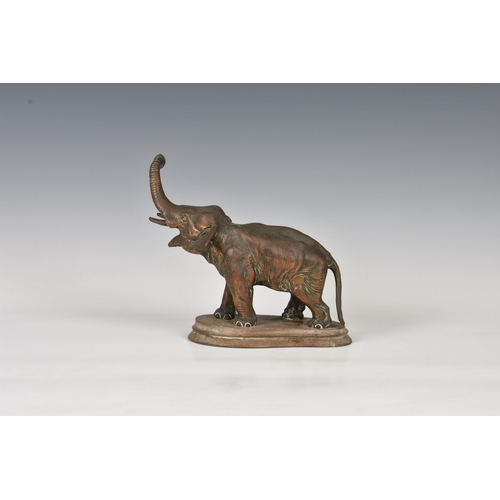 1186 - A realistically modeled copper elephant figureprobably early 20th century, modelled with raised trun... 